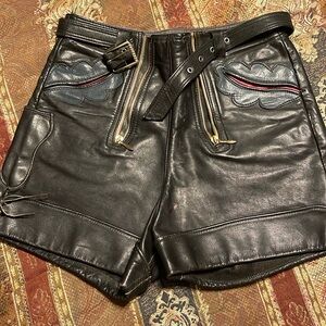 Black leather shorts.